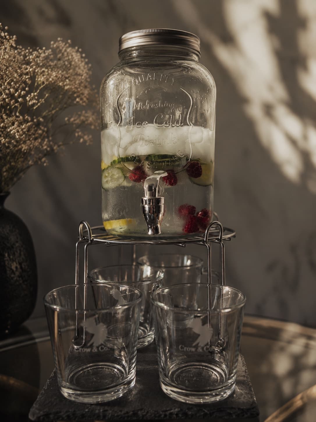 A refreshment station with infused water for clients
